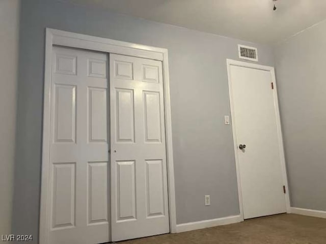 unfurnished bedroom featuring a closet