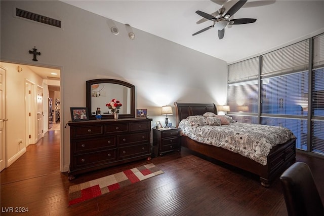 bedroom featuring dark wood-style flooring and ceiling fan