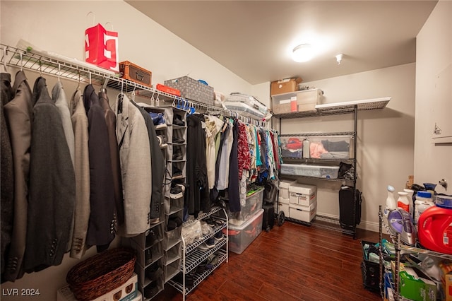 walk in closet featuring dark wood-type flooring