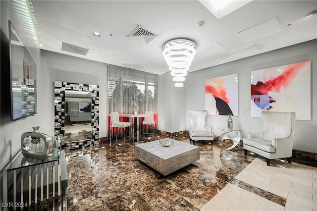 living room with an inviting chandelier