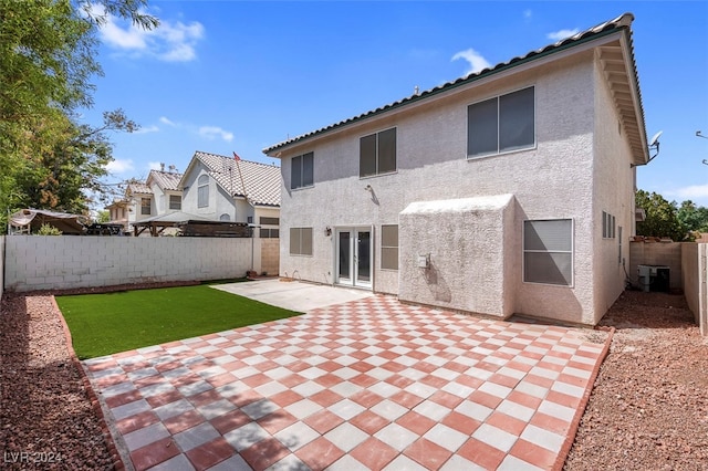 rear view of house with a patio area