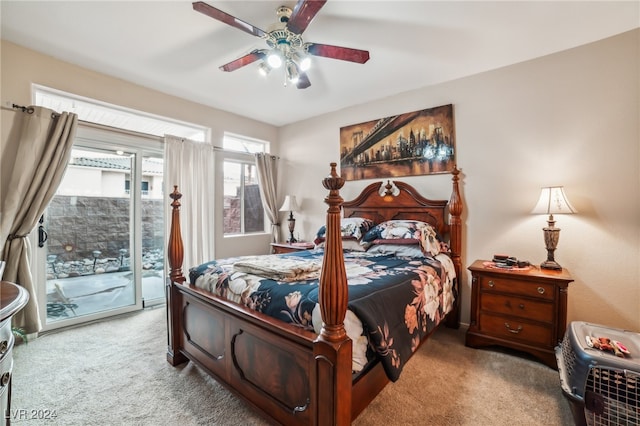 carpeted bedroom featuring ceiling fan and access to exterior