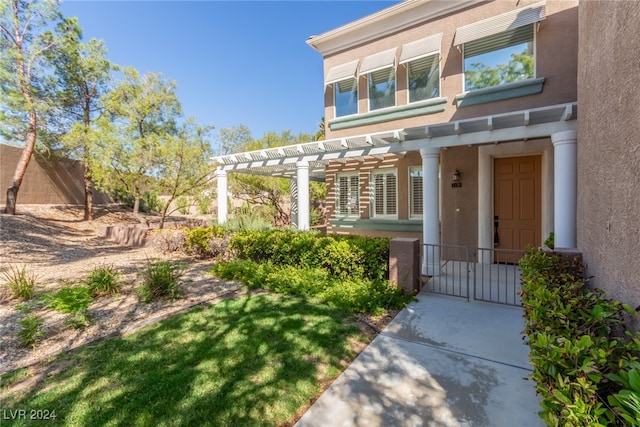 view of front of home featuring a pergola