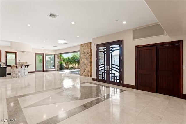 foyer featuring french doors