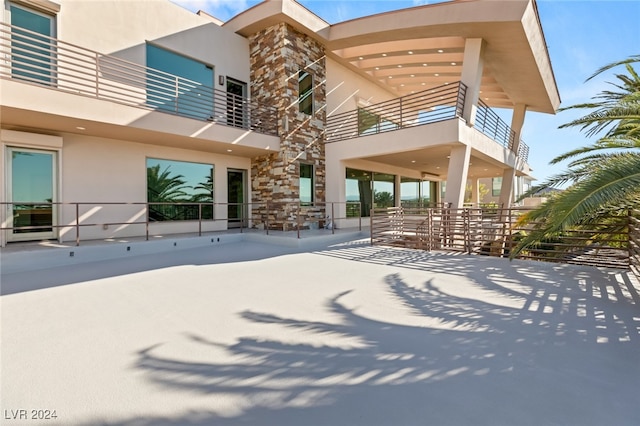 exterior space featuring a balcony