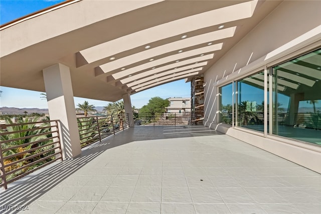 view of patio with a balcony