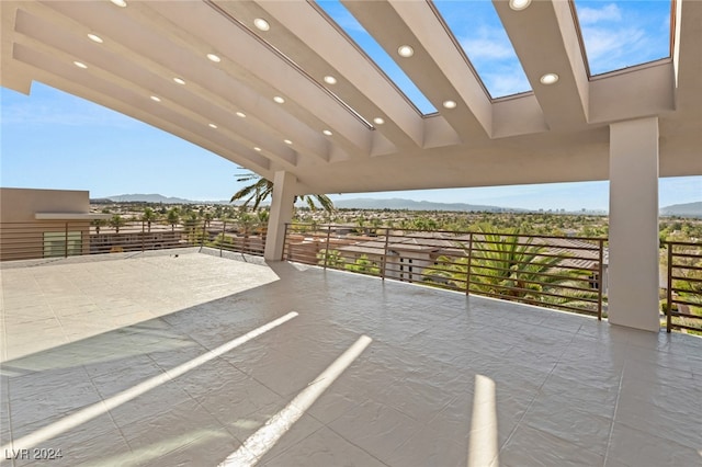 view of patio / terrace with a balcony