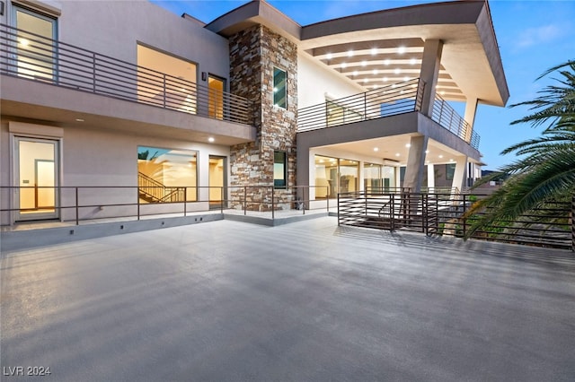 view of patio with a balcony