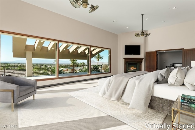 bedroom with light carpet and an inviting chandelier