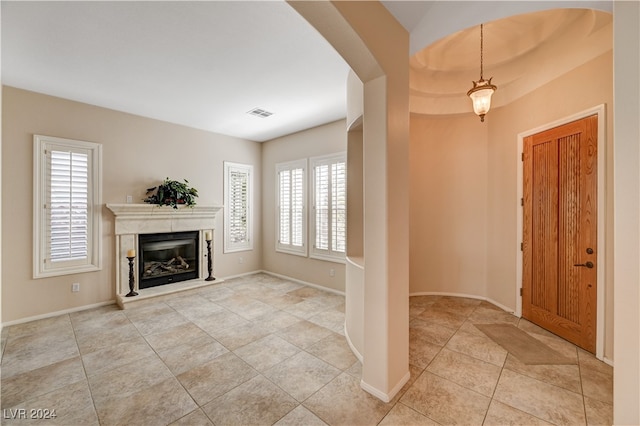 entrance foyer with light tile patterned floors