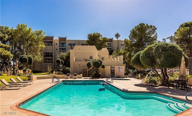 view of pool with a patio area