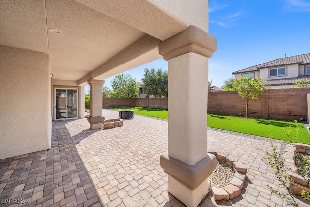 view of patio / terrace with a fire pit