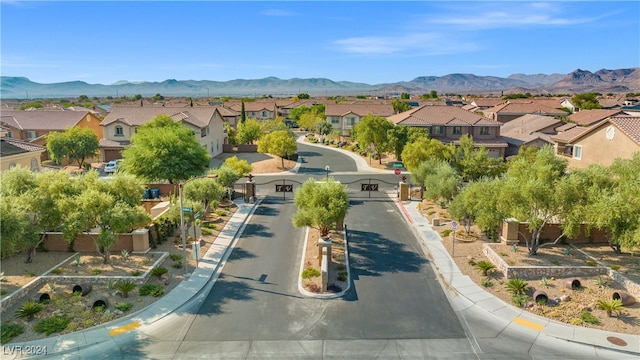 birds eye view of property featuring a mountain view