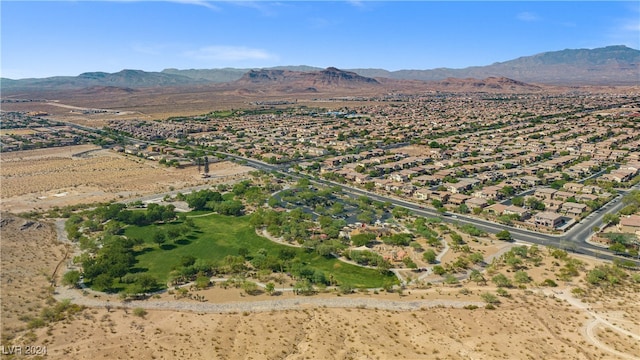 birds eye view of property featuring a mountain view