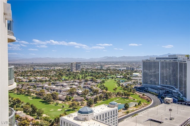 birds eye view of property with a mountain view