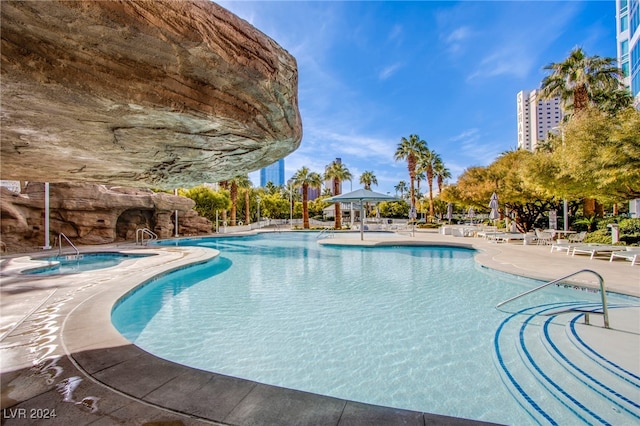 view of swimming pool featuring a patio area