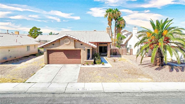 mediterranean / spanish-style house featuring a garage