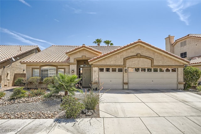 view of front of house with a garage