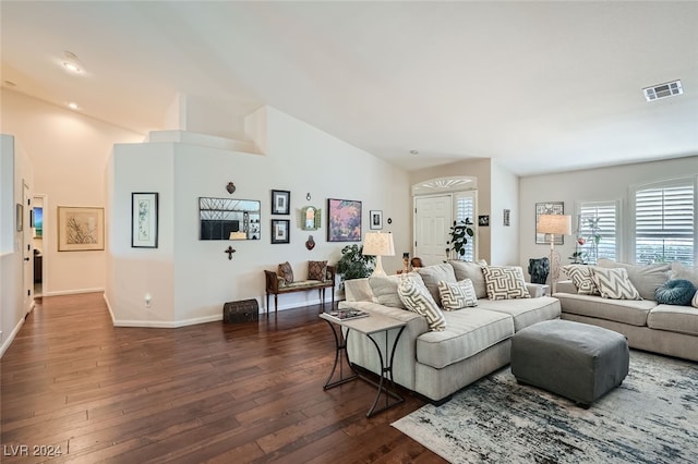 living room featuring dark hardwood / wood-style floors