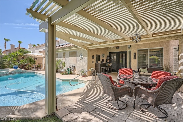 view of swimming pool featuring a pergola, an outdoor hangout area, a patio, and french doors