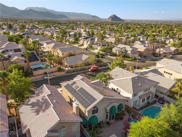 bird's eye view with a mountain view