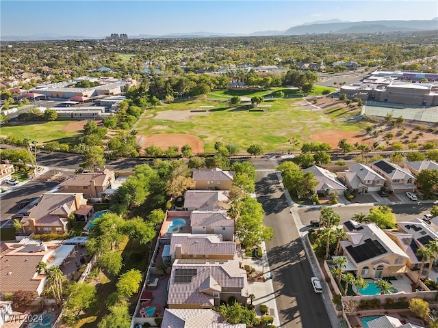 birds eye view of property featuring a mountain view