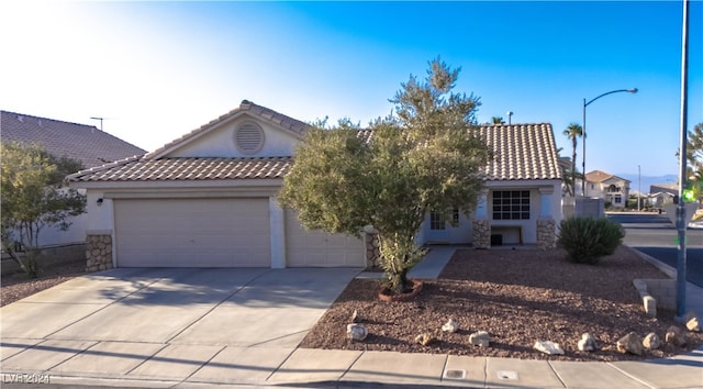 view of front of property featuring a garage