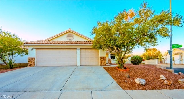 view of front of home featuring a garage