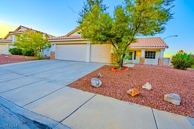 view of front of home featuring a garage