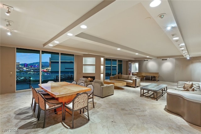 dining area featuring expansive windows