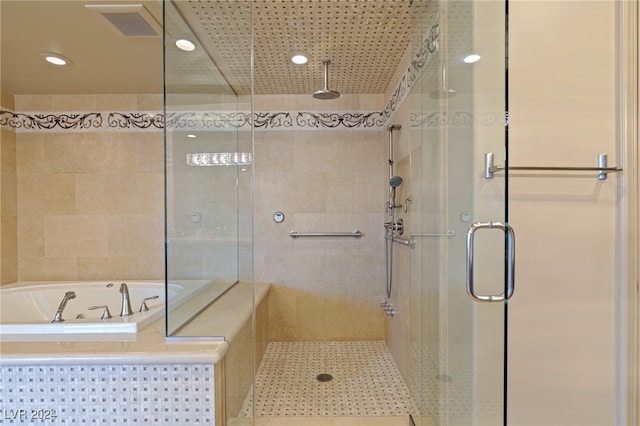 bathroom with plus walk in shower