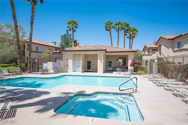 view of swimming pool featuring a patio area