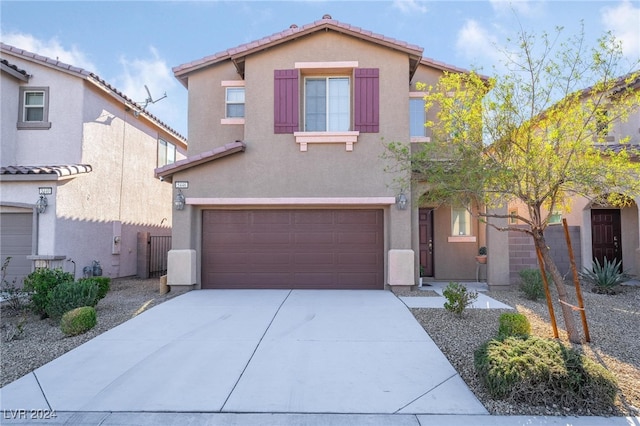 front of property featuring a garage