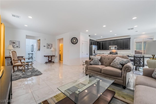 living room featuring light tile patterned floors