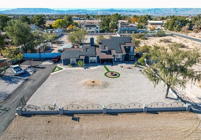 bird's eye view with a mountain view and a residential view