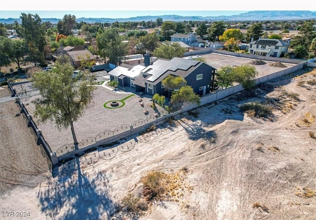 aerial perspective of suburban area with mountains