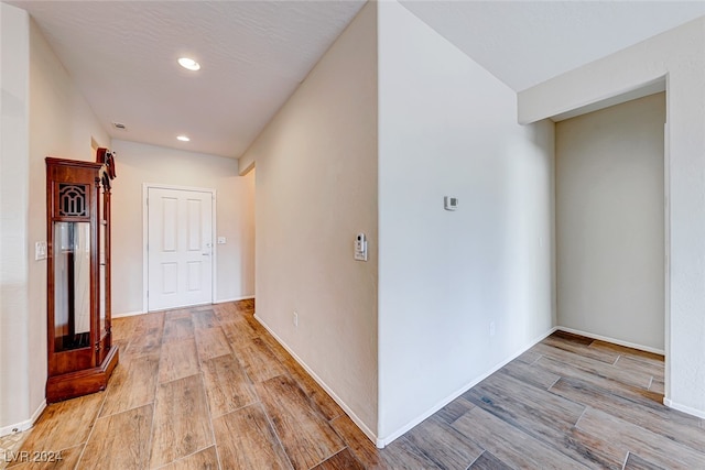 hallway featuring light hardwood / wood-style flooring