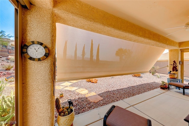 view of patio with ceiling fan