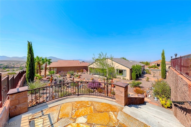 view of patio / terrace with a mountain view