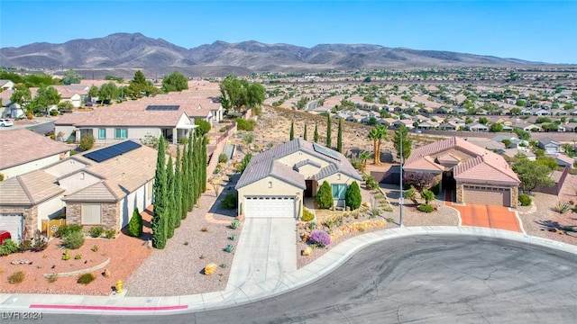 drone / aerial view with a mountain view