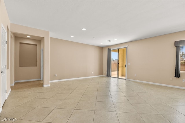 view of tiled spare room