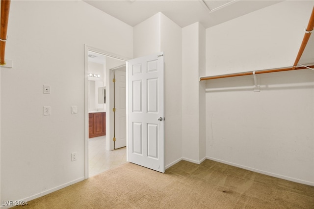 interior space featuring light colored carpet