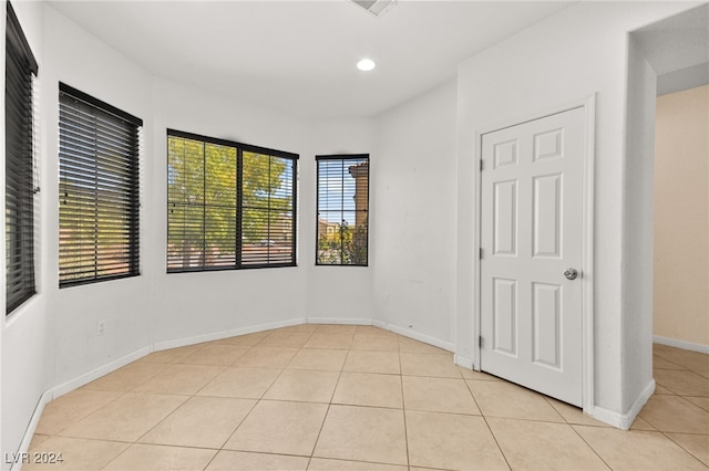 view of tiled spare room