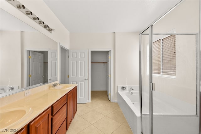 bathroom with vanity, plus walk in shower, and tile patterned floors