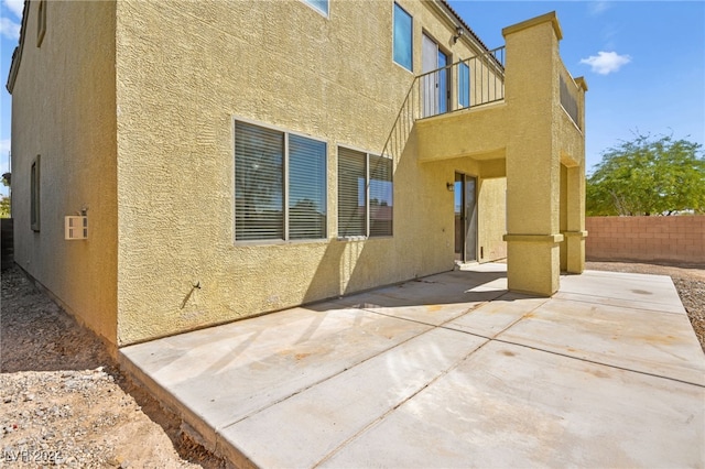 rear view of property with a patio area