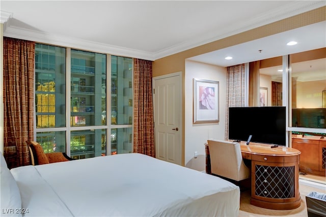 bedroom with ornamental molding