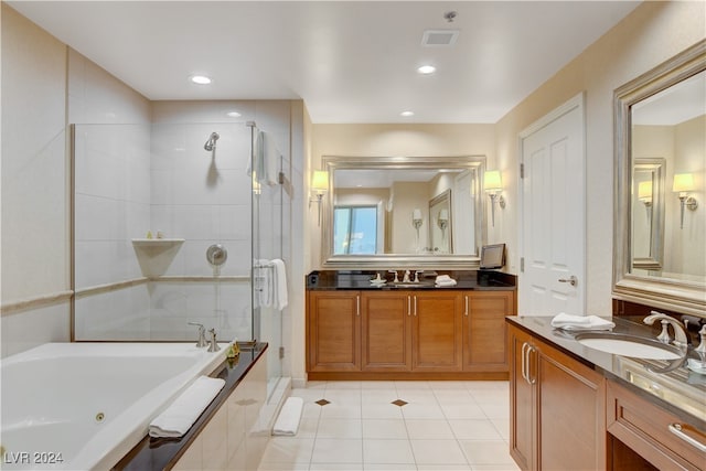 bathroom with vanity, plus walk in shower, and tile patterned floors