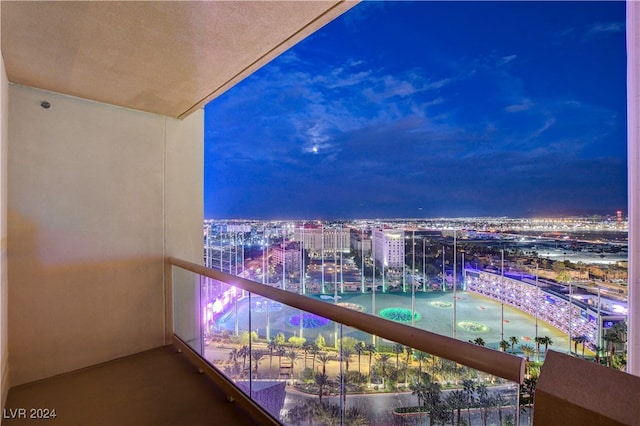 view of balcony at twilight