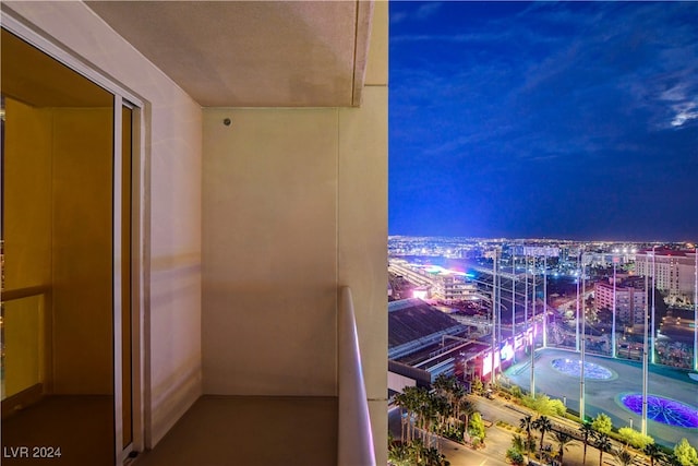 view of balcony at twilight