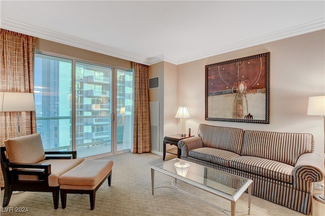 carpeted living room featuring ornamental molding and a healthy amount of sunlight